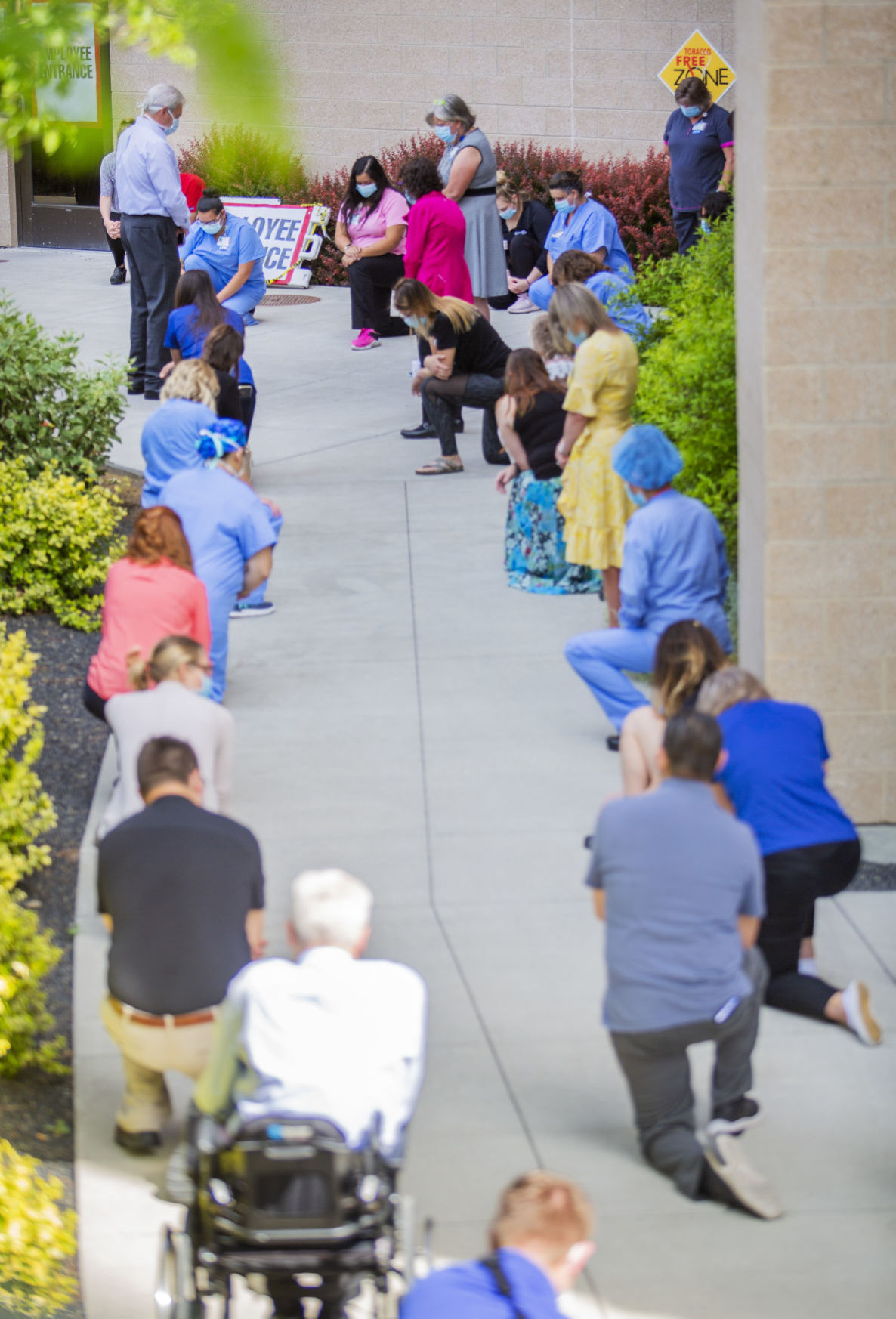 Hospital staff show solidarity with moment of silence